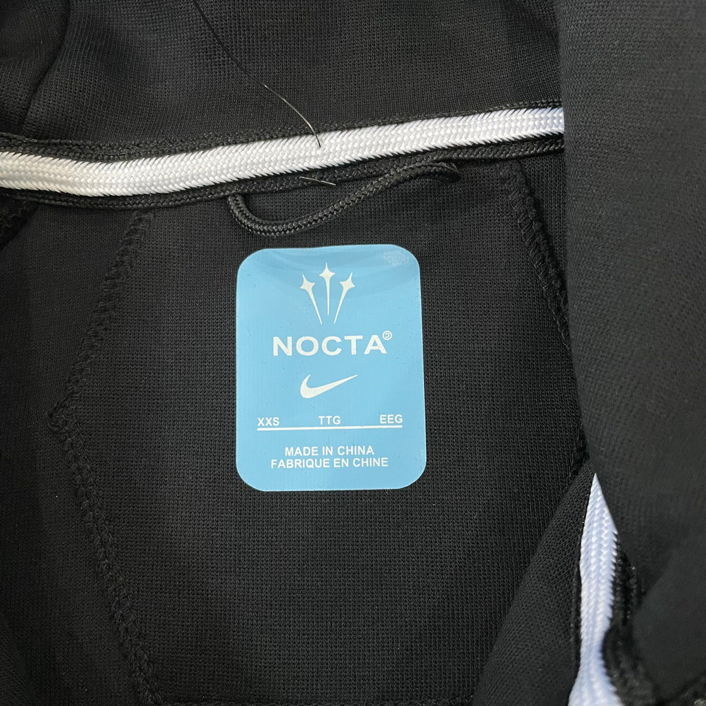 Sudadera Nike x NOCTA Tech Fleece Full-Zip Hoodie (Black / University Gold)