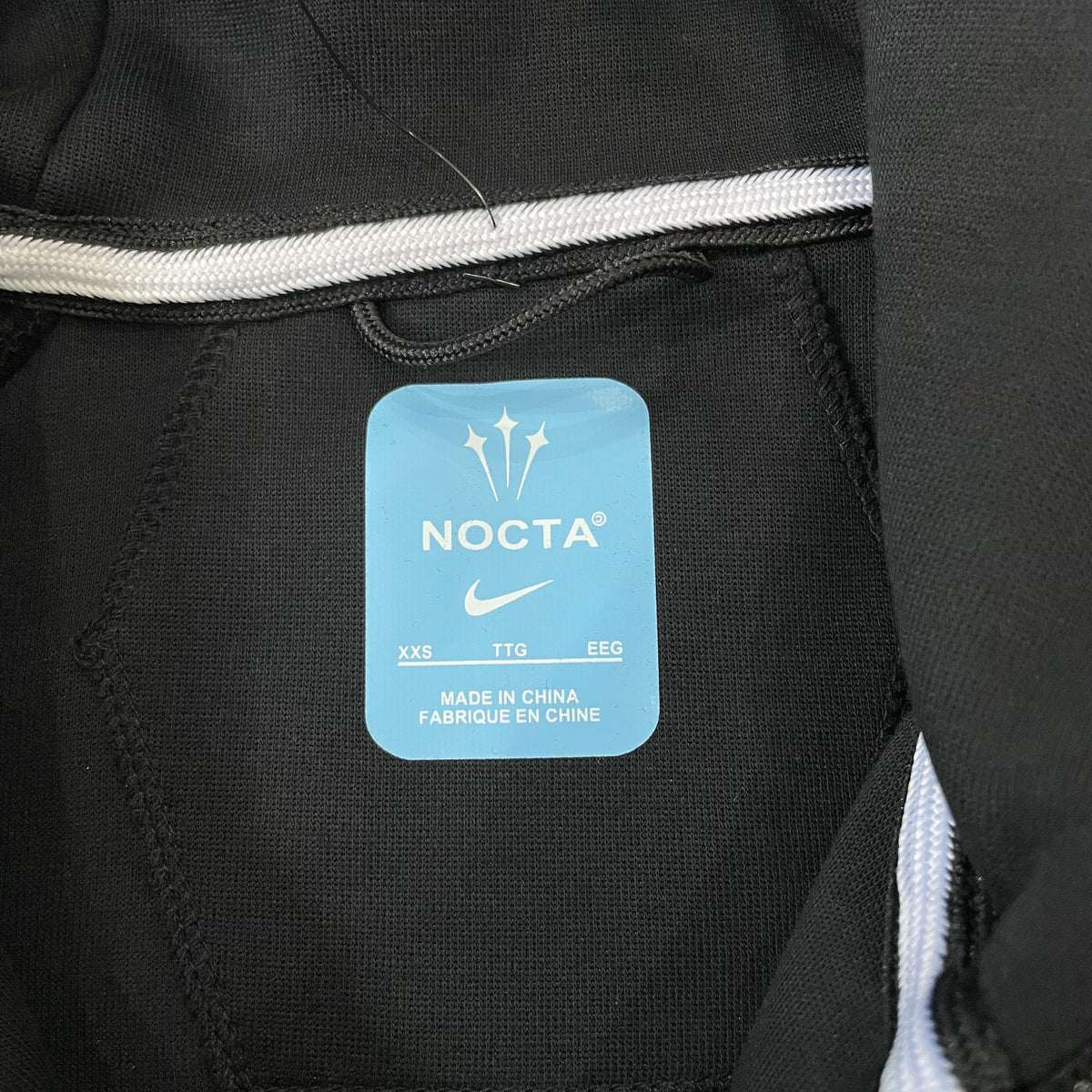 Sudadera Nike x NOCTA Tech Fleece Full-Zip Hoodie (Black / University Gold)