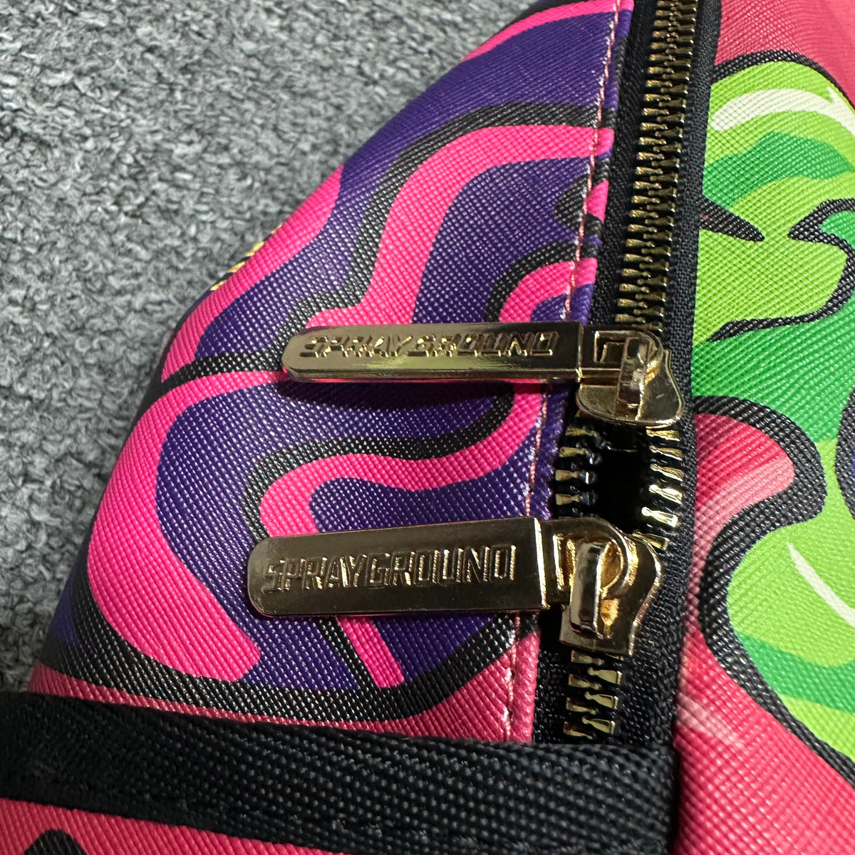 Mochila Sprayground 90s Nick Slime Drip DLXR (Edición Limitada)