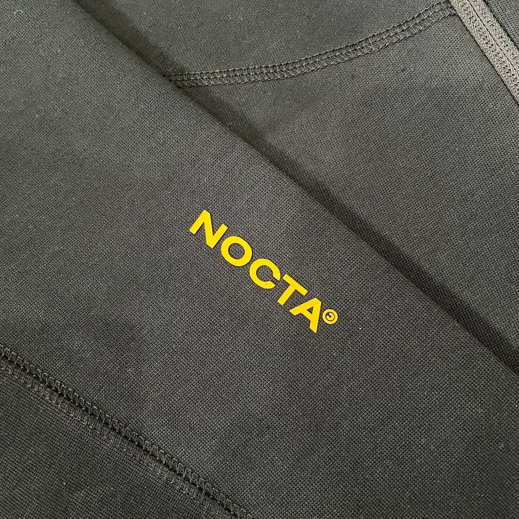 Sudadera Nike x NOCTA Tech Fleece Full-Zip Hoodie (Black / University Gold)