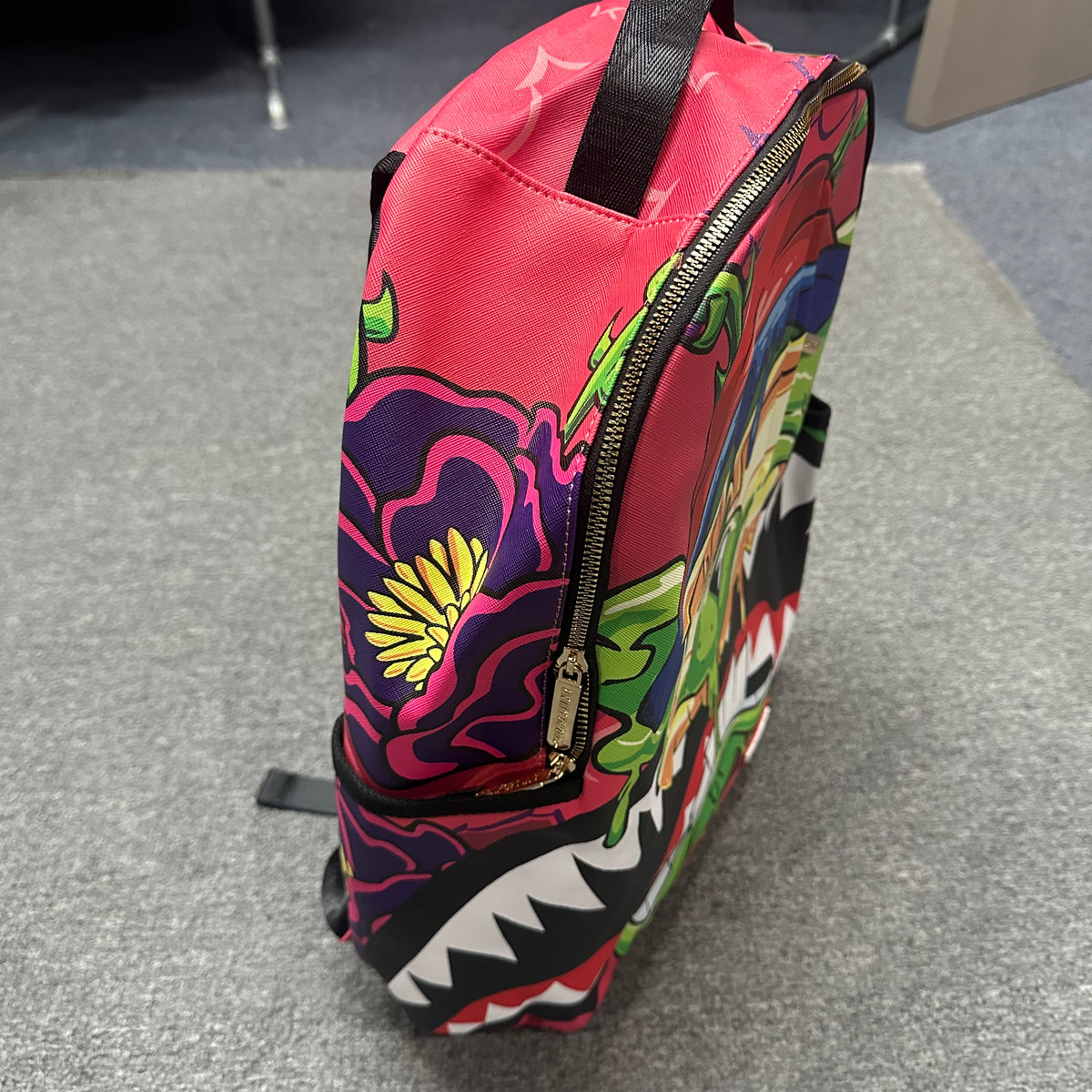 Mochila Sprayground 90s Nick Slime Drip DLXR (Edición Limitada)